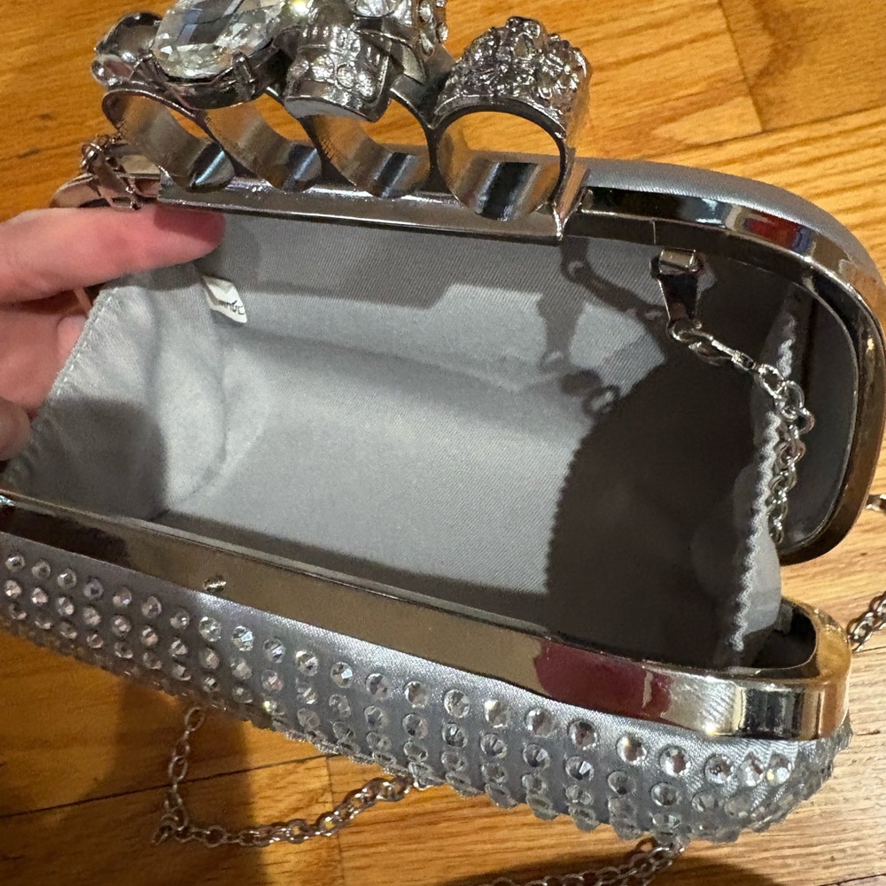 Elegant Silver Clutch Bag with Skulls and Dinamites